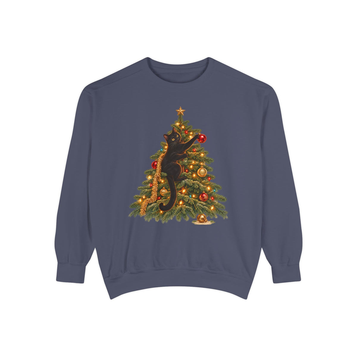 Black cat Christmas sweatshirt in Denim – a black cat climbing a lit Christmas tree with a gold star, one paw on a red ornament, printed large on the chest of a Comfort Colors crewneck
