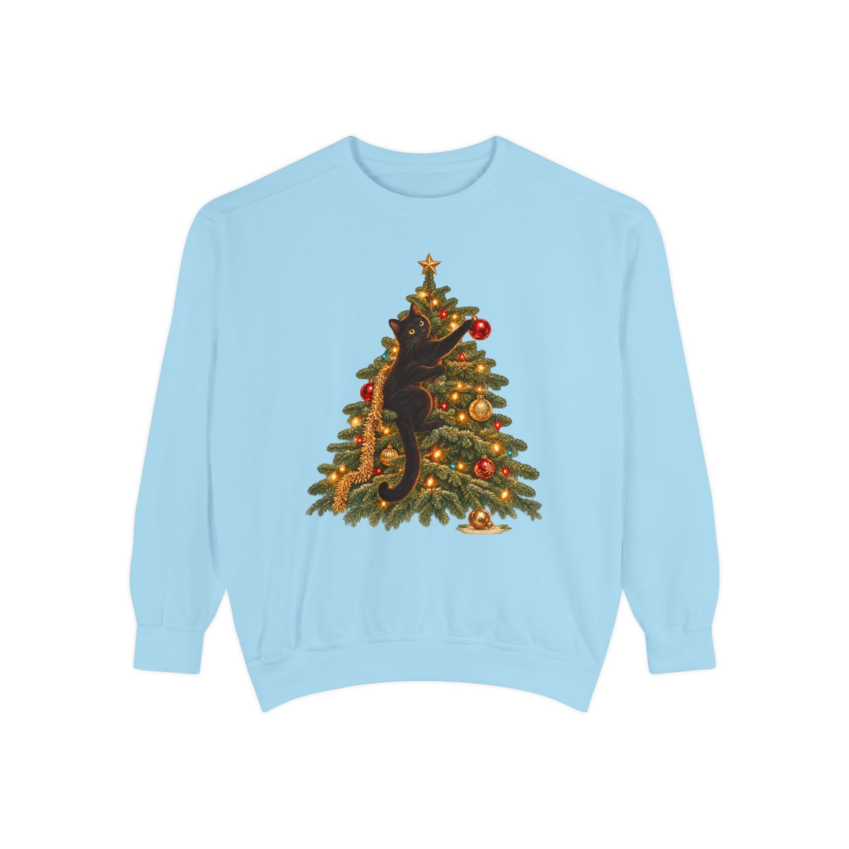 Black cat Christmas sweatshirt in Chambray – a black cat climbing a lit Christmas tree with a gold star, one paw on a red ornament, printed large on the chest of a Comfort Colors crewneck