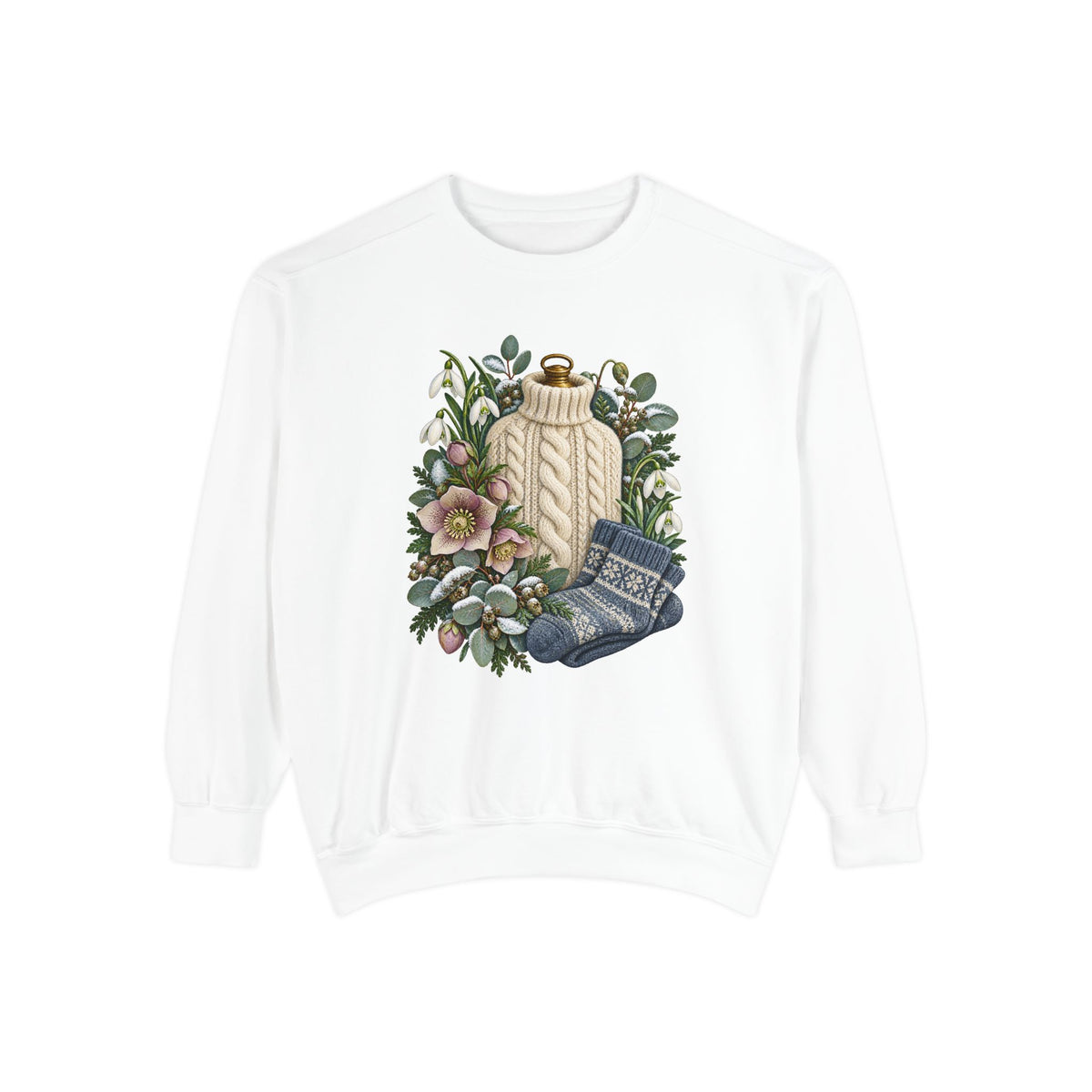 Snowdrop and hellebore winter print on a heavyweight garment-dyed Comfort Colors 1566 crewneck - a cream cable-knit bottle cover standing among white snowdrops, pink hellebores, folded blue patterned socks and snow-dusted evergreen