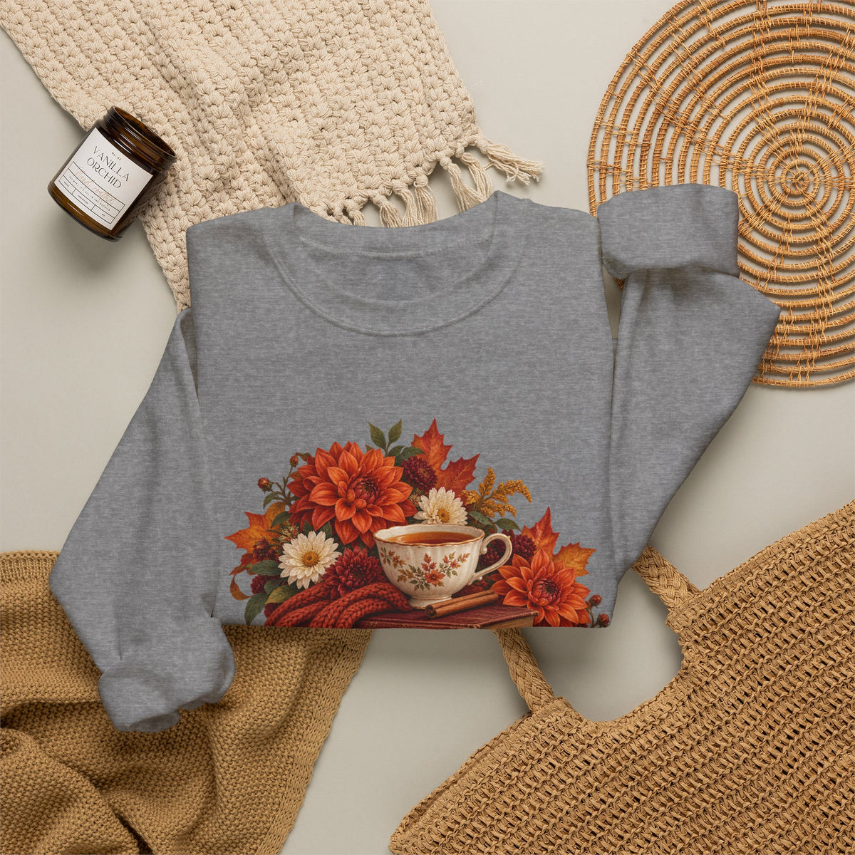 Just One More Chapter crewneck sweatshirt, a floral teacup resting on a stack of vintage books with pears, autumn flowers and a rust-colored scarf, image 13 of 14