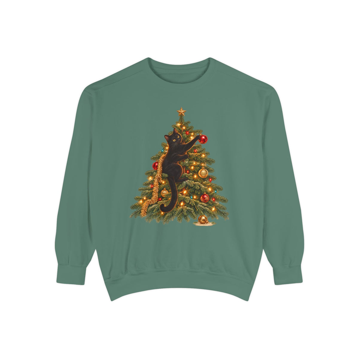 Black cat Christmas sweatshirt in Light Green – a black cat climbing a lit Christmas tree with a gold star, one paw on a red ornament, printed large on the chest of a Comfort Colors crewneck