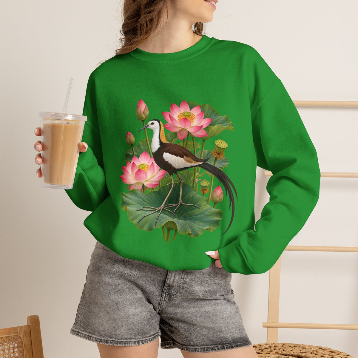 Lightly, She Goes crewneck sweatshirt, a long-tailed waterbird among pink lotus blossoms, buds, seed pods and broad green leaves, image 19 of 28