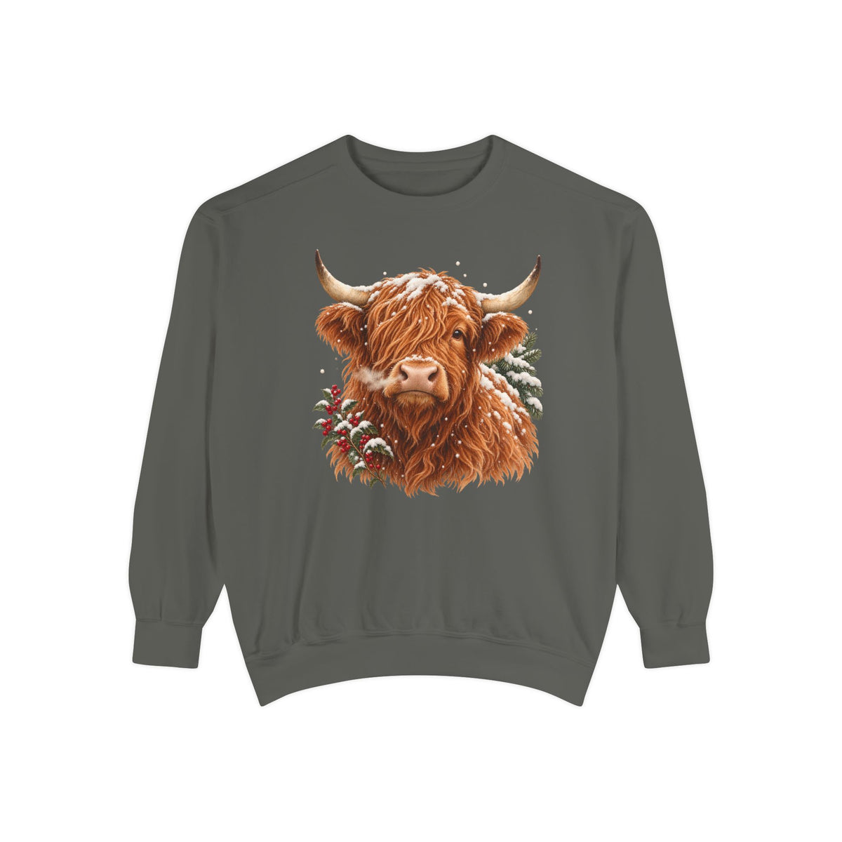 Highland cow sweatshirt in Pepper – a shaggy ginger Highland cow with snow on its fringe, a snowy pine bough and red berries, painted vintage-poster style, printed large on the chest of a Comfort Colors crewneck