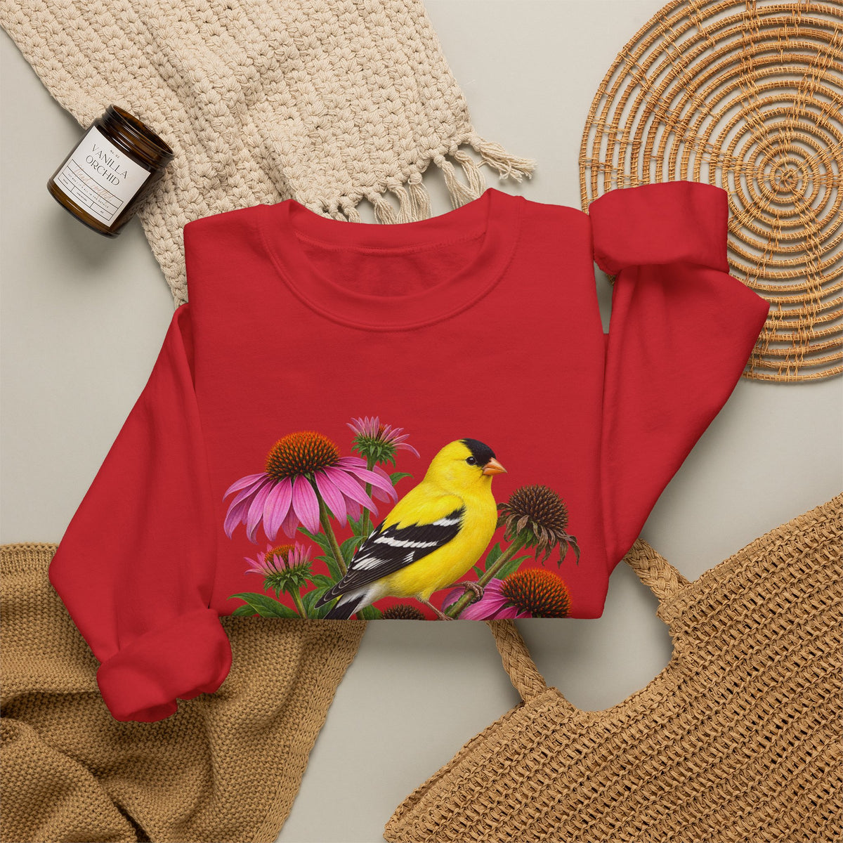 A Small Bright Thing crewneck sweatshirt, a golden-yellow American goldfinch among pink coneflowers, seed heads and green leaves, image 7 of 22