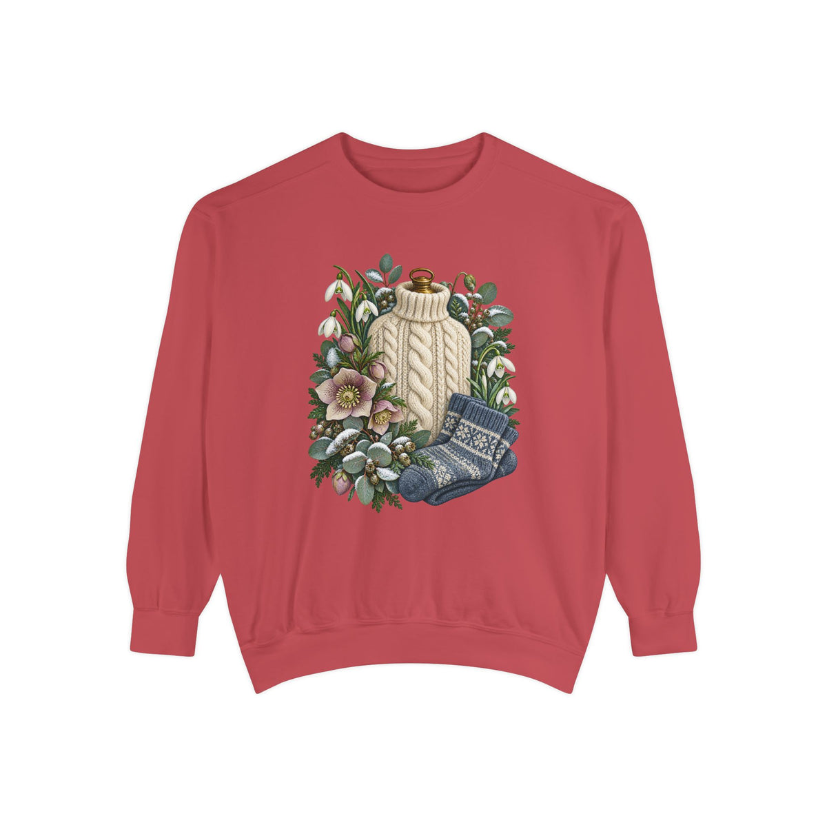 Cream cable-knit bottle cover illustration on a 9.5 oz garment-dyed cotton-blend crewneck pullover - a cream cable-knit bottle cover standing among white snowdrops, pink hellebores, folded blue patterned socks and snow-dusted evergreen