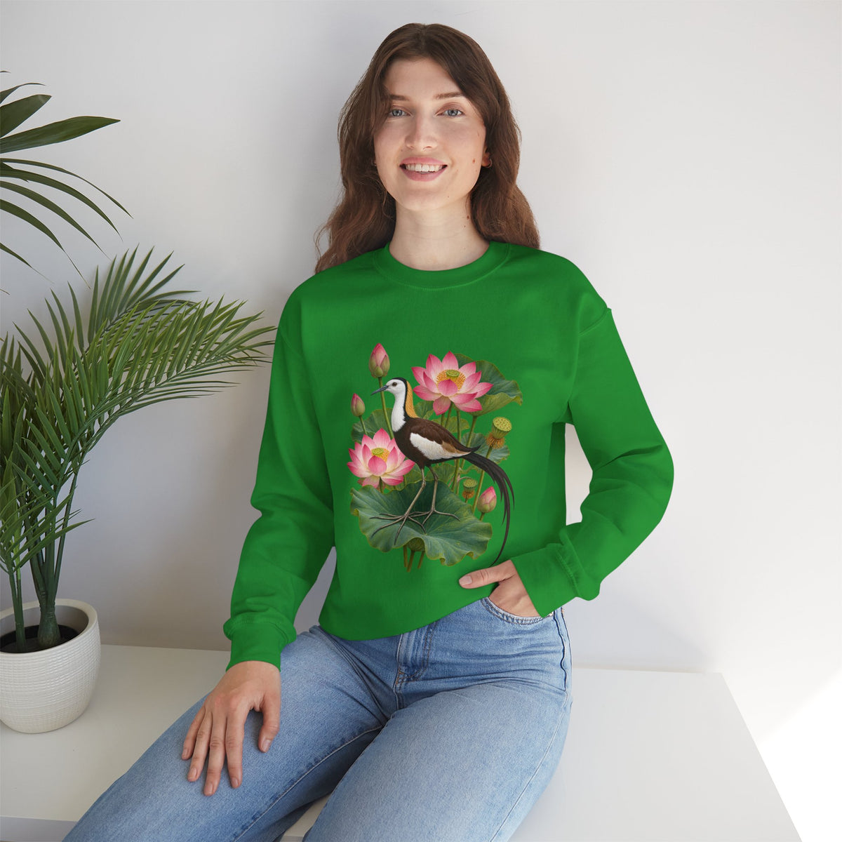 Lightly, She Goes crewneck sweatshirt, a long-tailed waterbird among pink lotus blossoms, buds, seed pods and broad green leaves, image 18 of 28