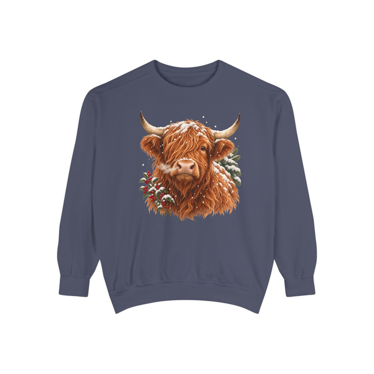 Highland cow sweatshirt in Denim – a shaggy ginger Highland cow with snow on its fringe, a snowy pine bough and red berries, painted vintage-poster style, printed large on the chest of a Comfort Colors crewneck