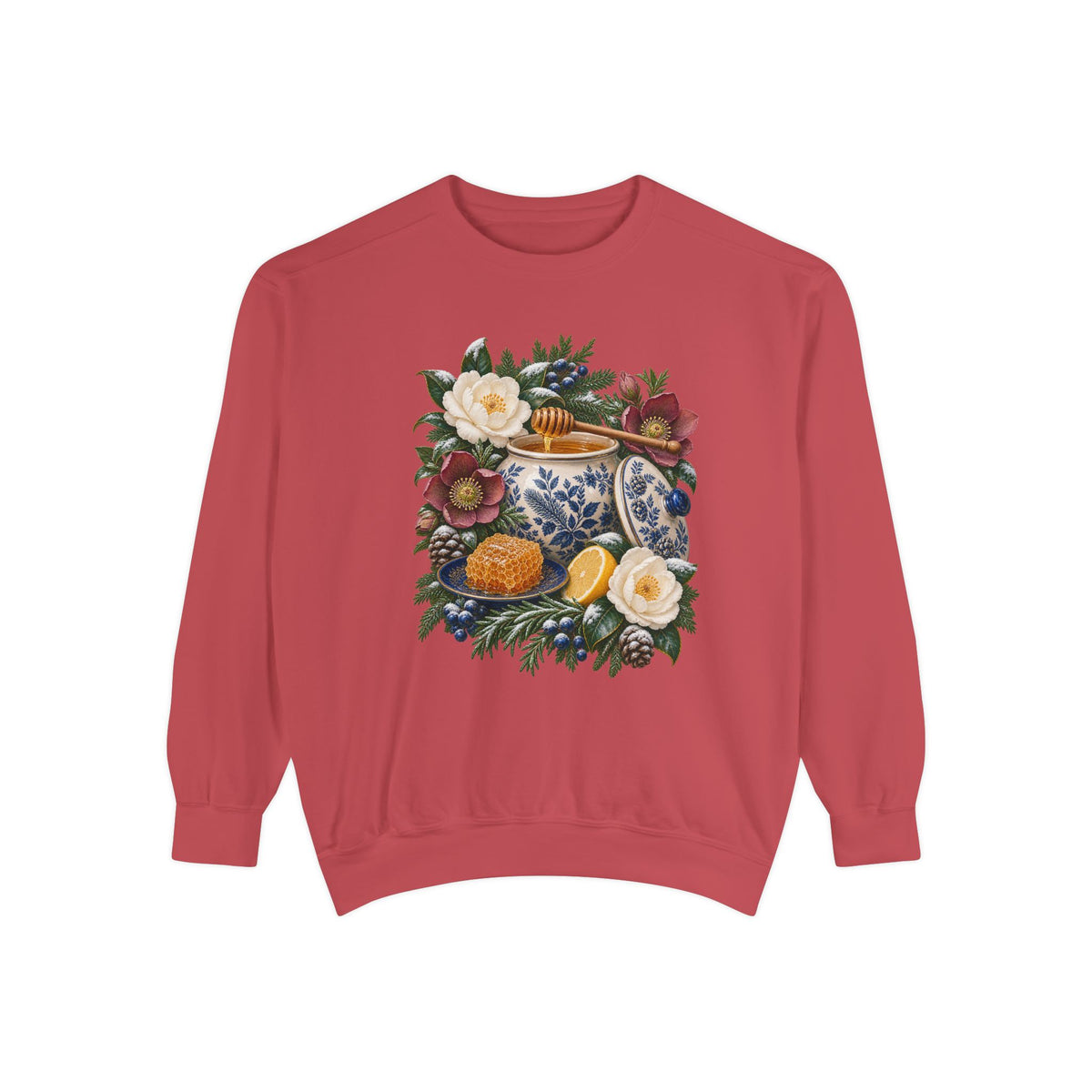 Winter still-life crewneck with 1x1 ribbed collar, cuffs and waistband, no hood and no front pocket — a cream and cobalt transferware jar of honey with a wooden dipper, honeycomb on a blue plate and a cut lemon among winter florals