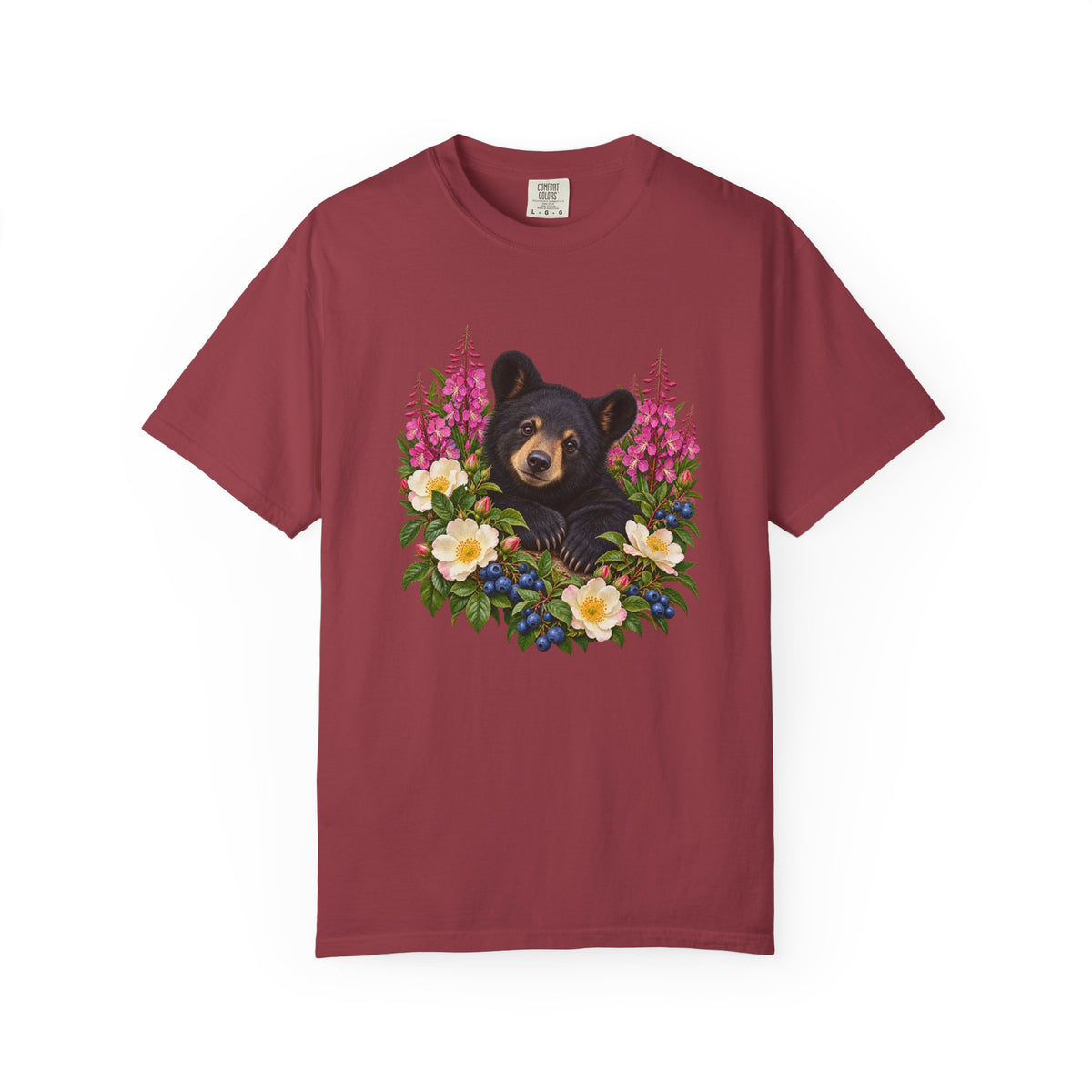 Black Bear and Fireweed T-Shirt - a black bear cub framed by tall magenta fireweed spikes, white wild roses and clusters of ripe blueberries, on a garment-dyed Comfort Colors tee