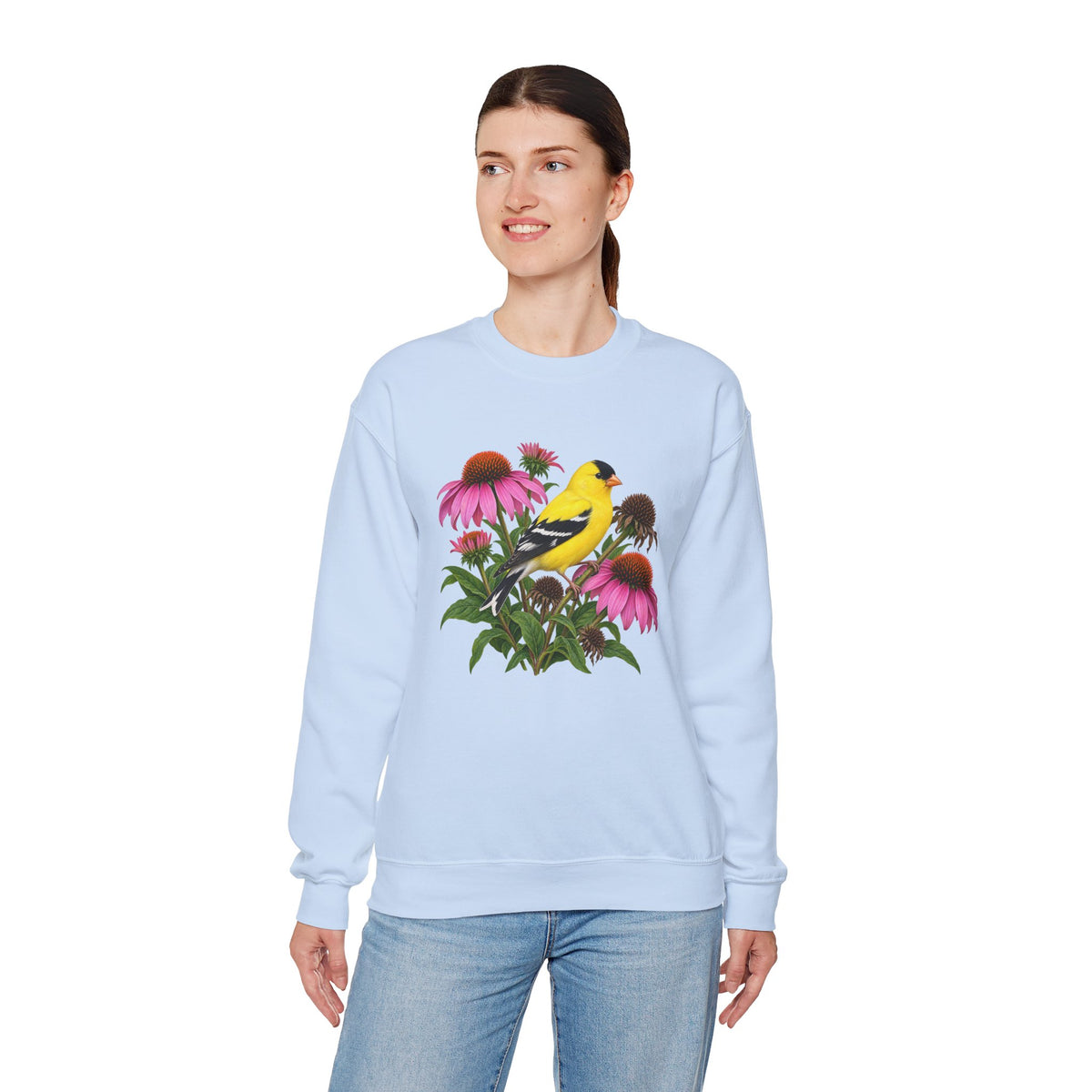 A Small Bright Thing crewneck sweatshirt, a golden-yellow American goldfinch among pink coneflowers, seed heads and green leaves, image 19 of 22