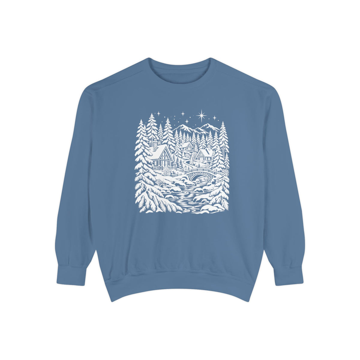 Starlit Cabins & River Line Art Sweatshirt — two steep-roofed cabins among snow-laden pines, a stone footbridge over a running river and a large star above the mountain ridge, drawn in white line art on a garment-dyed Comfort Colors crewneck