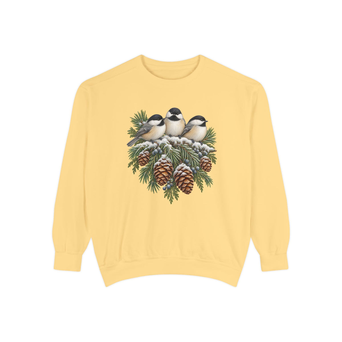 Chickadee sweatshirt in Butter, a pale yellow garment-dyed Comfort Colors 1566 crewneck with three winter chickadees and pinecones