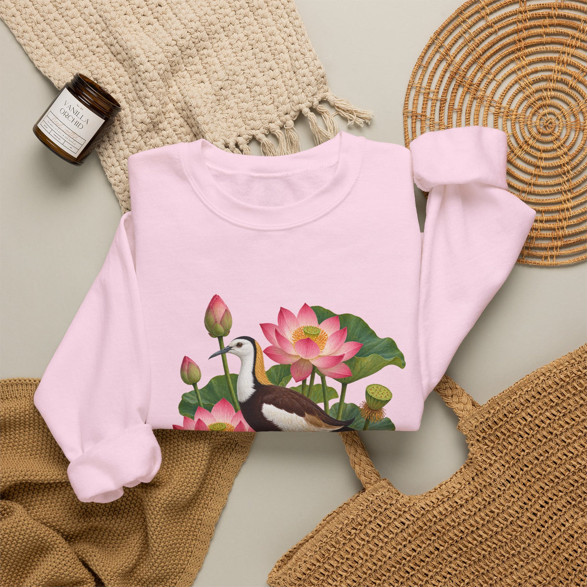 Lightly, She Goes crewneck sweatshirt, a long-tailed waterbird among pink lotus blossoms, buds, seed pods and broad green leaves, image 20 of 28