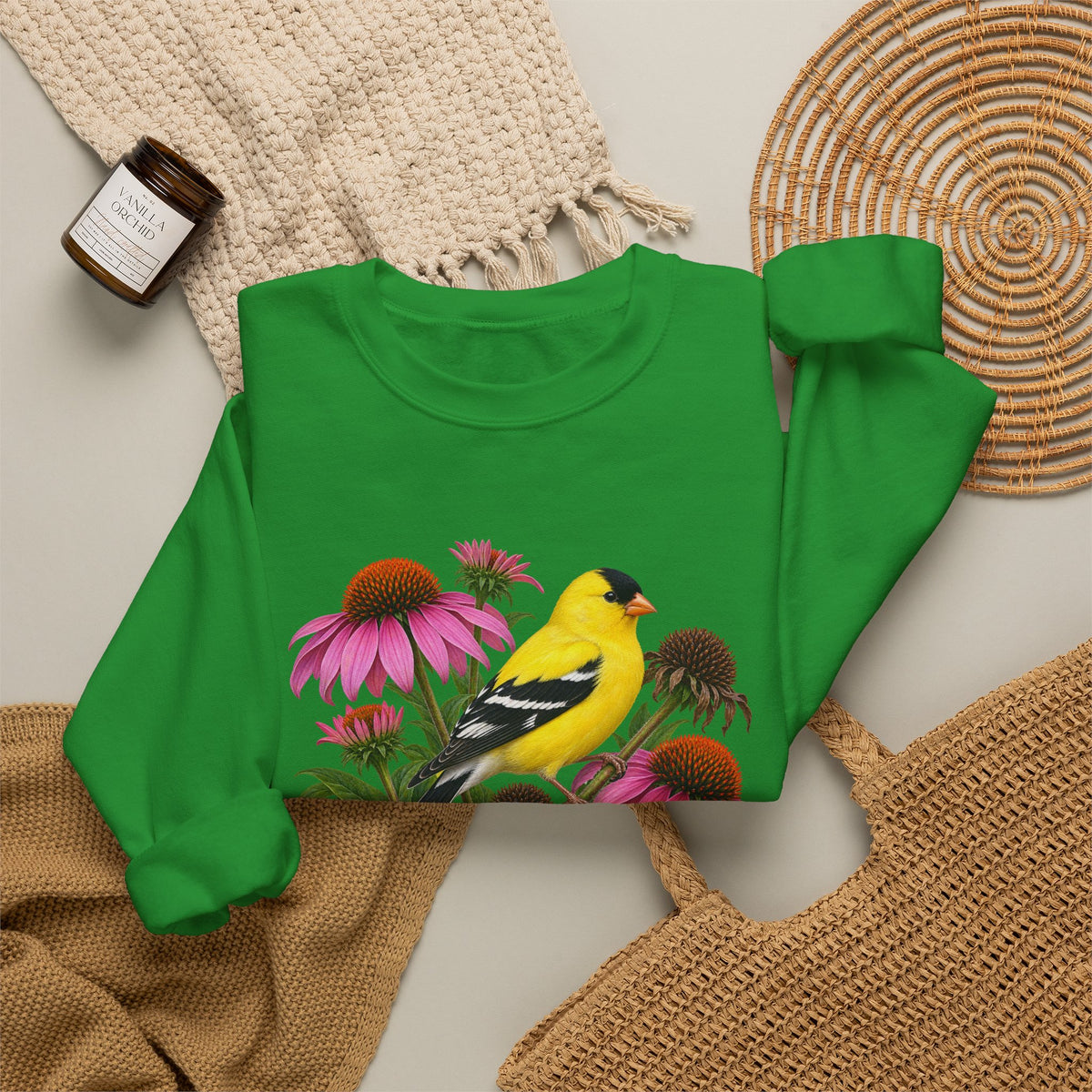 A Small Bright Thing crewneck sweatshirt, a golden-yellow American goldfinch among pink coneflowers, seed heads and green leaves, image 15 of 22