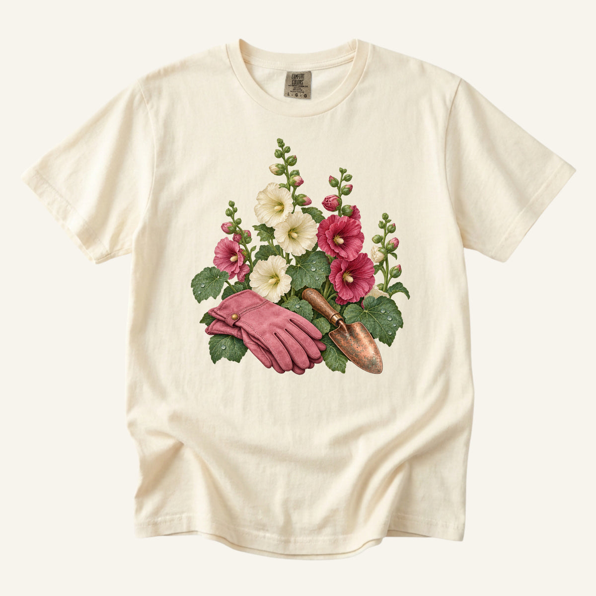 Gardening T-Shirt in Ivory — rose gardening gloves, a vintage trowel and burgundy and cream hollyhocks