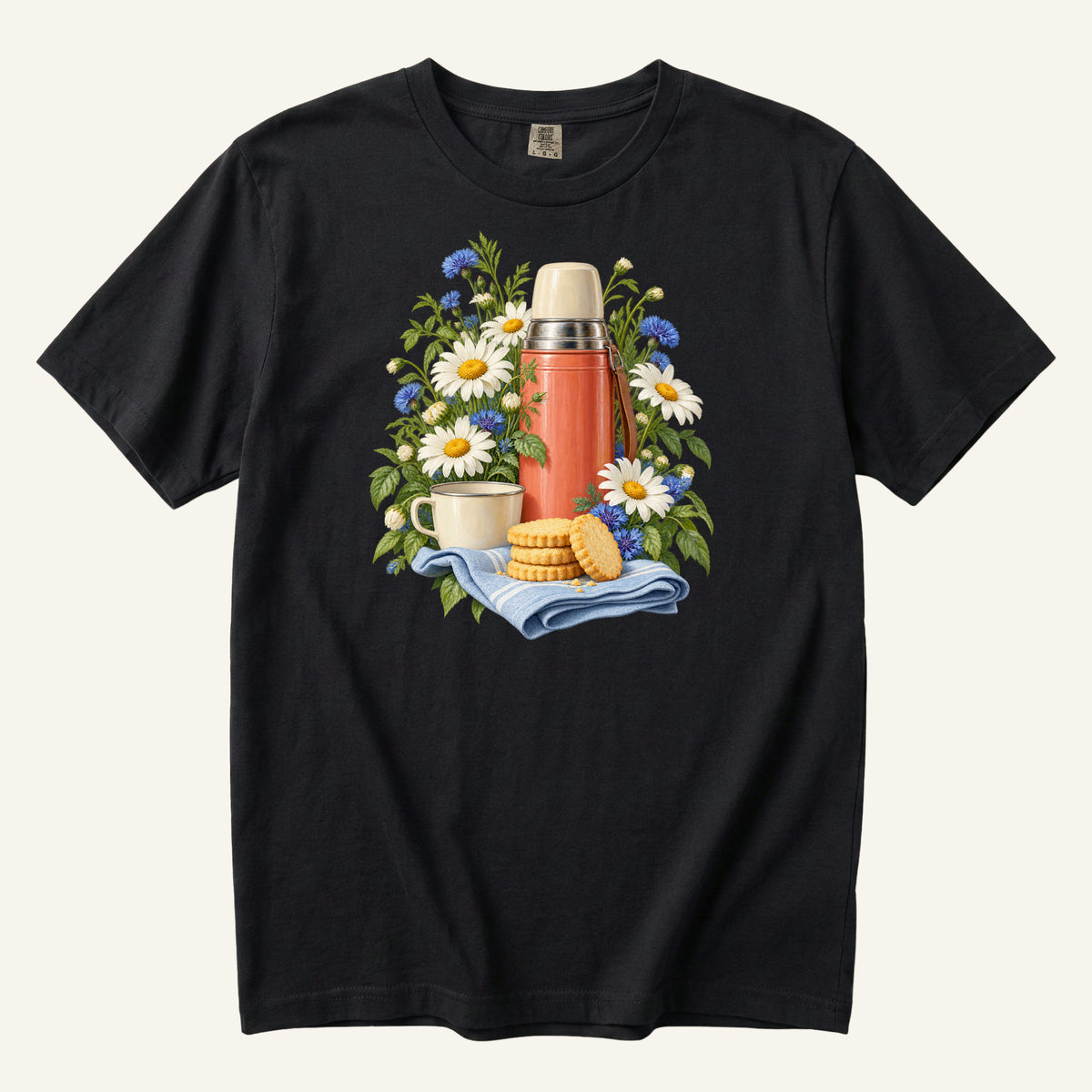A Little Further, Then Tea t-shirt in Black — vintage red tea flask among white daisies and blue flowers with a cup and biscuits on folded cloth, garment-dyed Comfort Colors 1717 tee