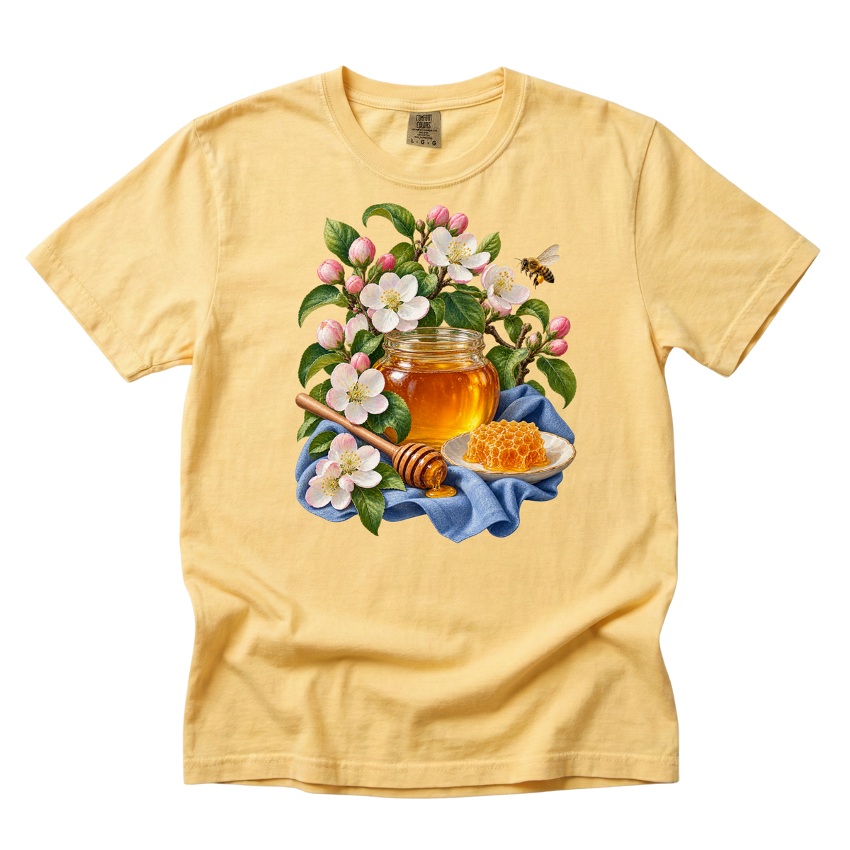 A Little Gold for Later premium tee in Butter, a jar of honey with honeycomb and blossoms