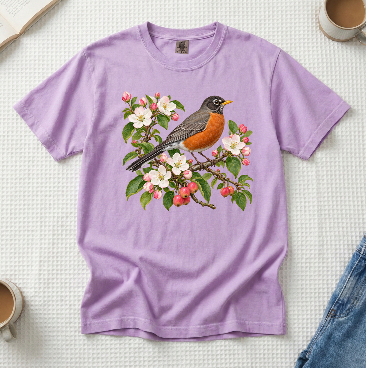 A Song for the New Place robin tee in Orchid, a robin among pink buds and apple blossoms