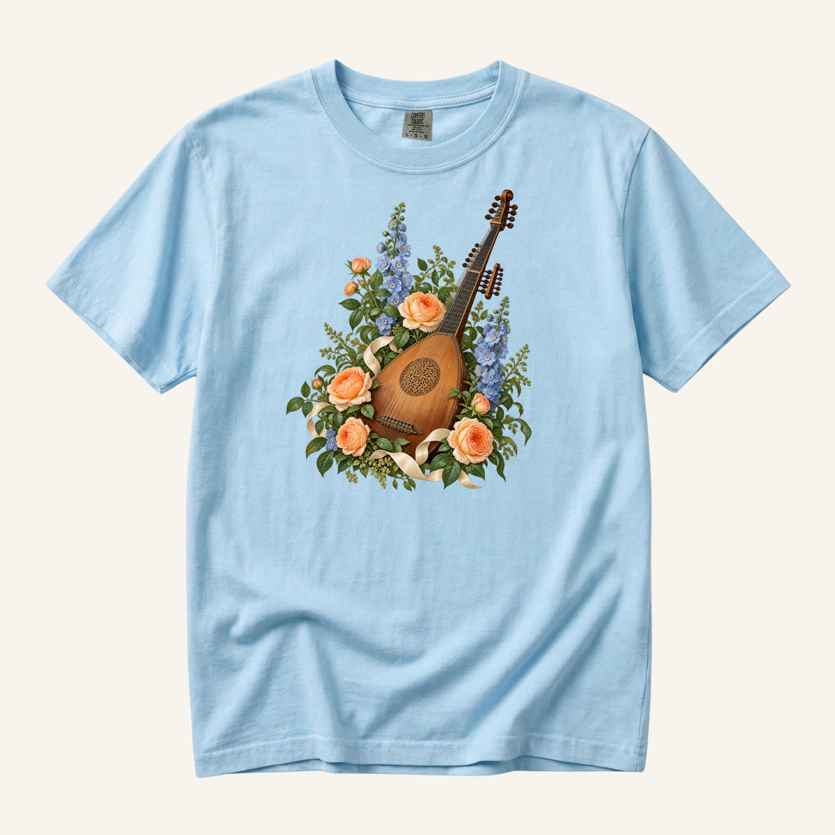 Vintage wooden lute with a carved rose sound hole among apricot roses and tall blue blossoms, printed on a Chambray blue Comfort Colors 1717 unisex t-shirt