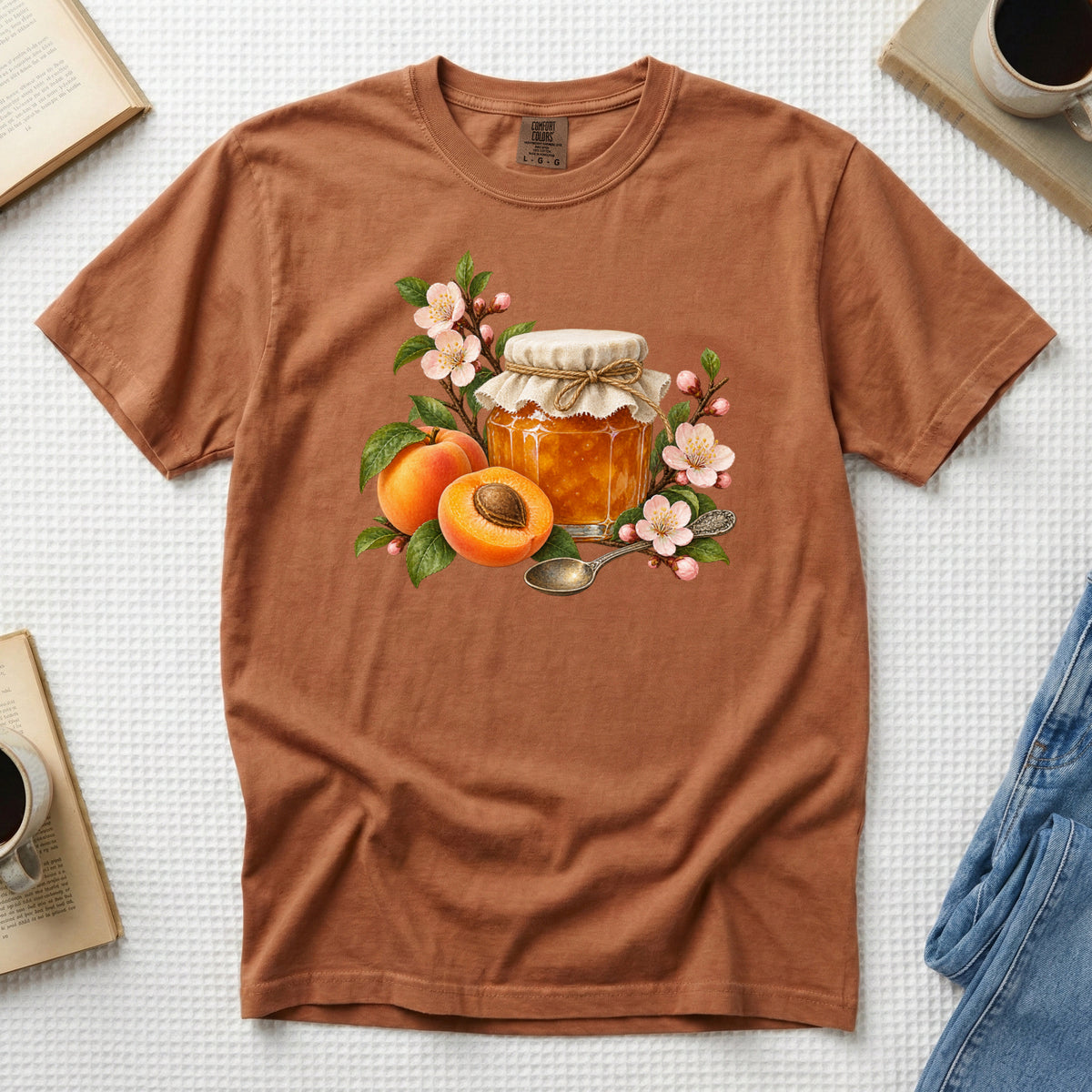 Apricot Jam & Blossoms T-Shirt in Yam — warm harvest tone behind the apricot jam jar and blossoms