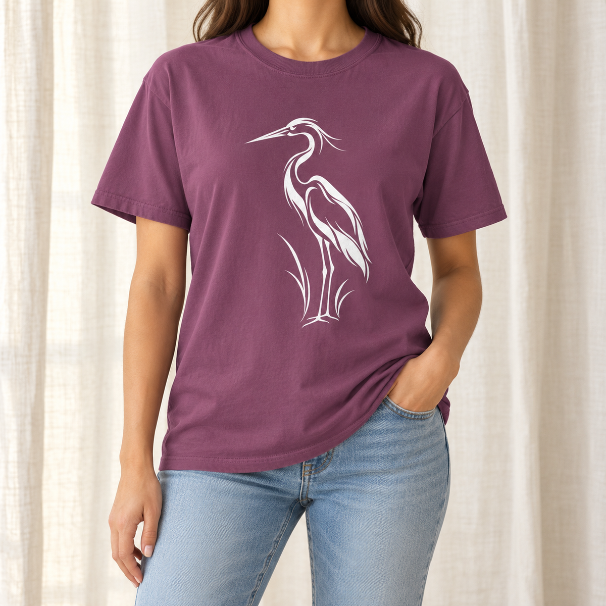 Flowing Great Blue Heron T-Shirt in Berry — a great blue heron in reeds drawn in flowing white line art on a garment-dyed Comfort Colors tee