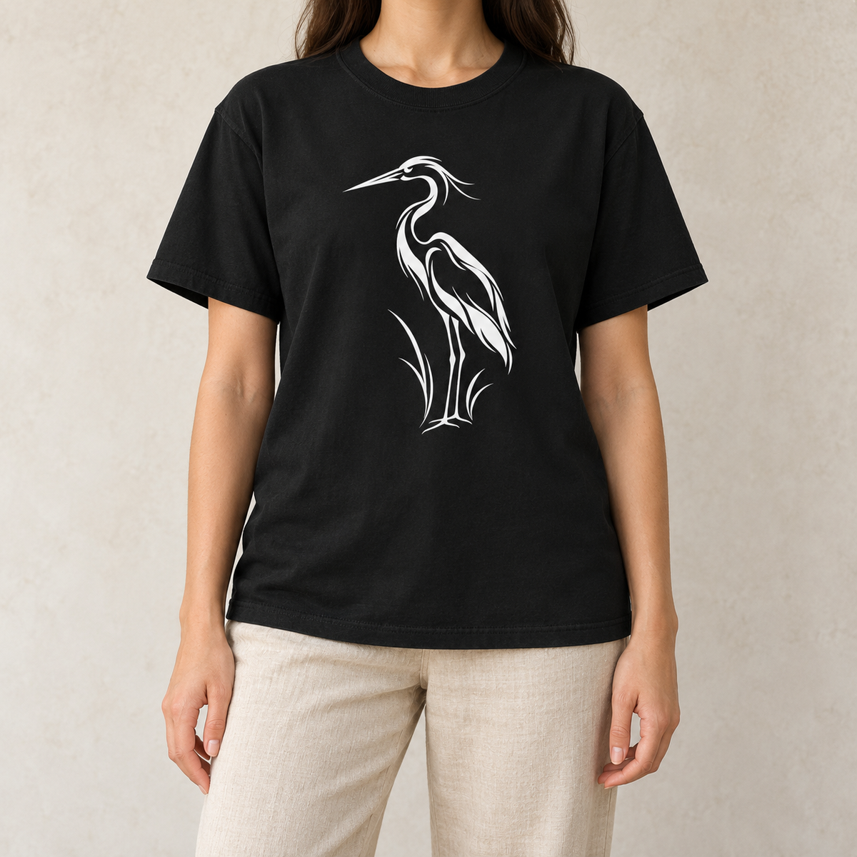 Flowing Great Blue Heron T-Shirt in Black — white line-art heron on a garment-dyed Comfort Colors tee