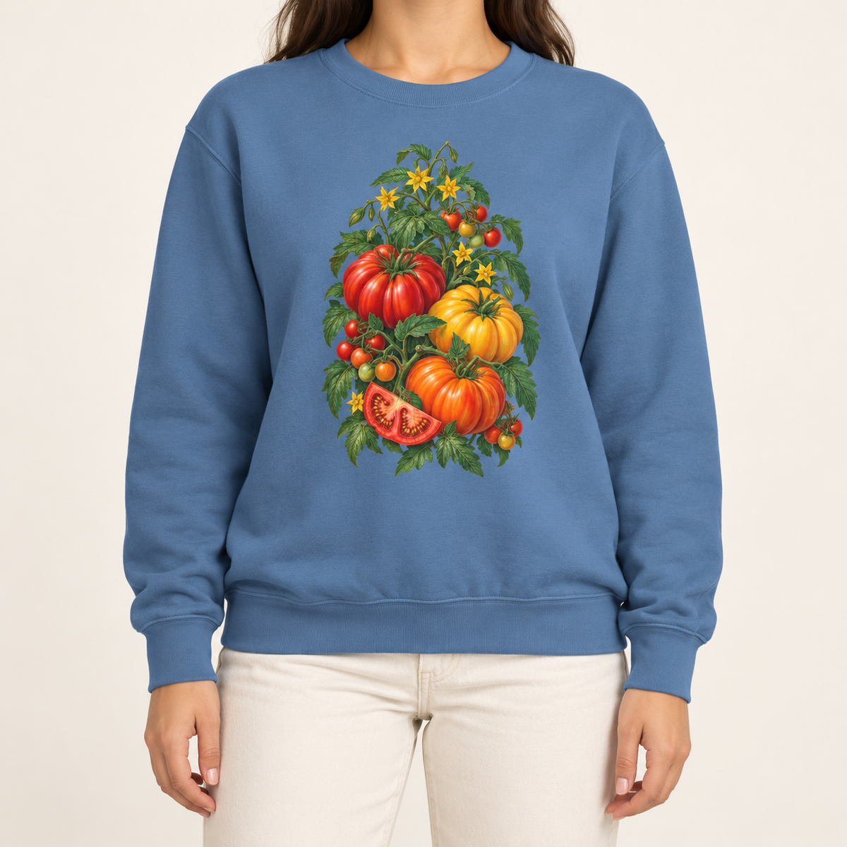 Heirloom tomato sweatshirt in Blue Jean – red, orange and yellow heirloom tomatoes on the vine with blossoms, printed large on the chest of a Comfort Colors crewneck