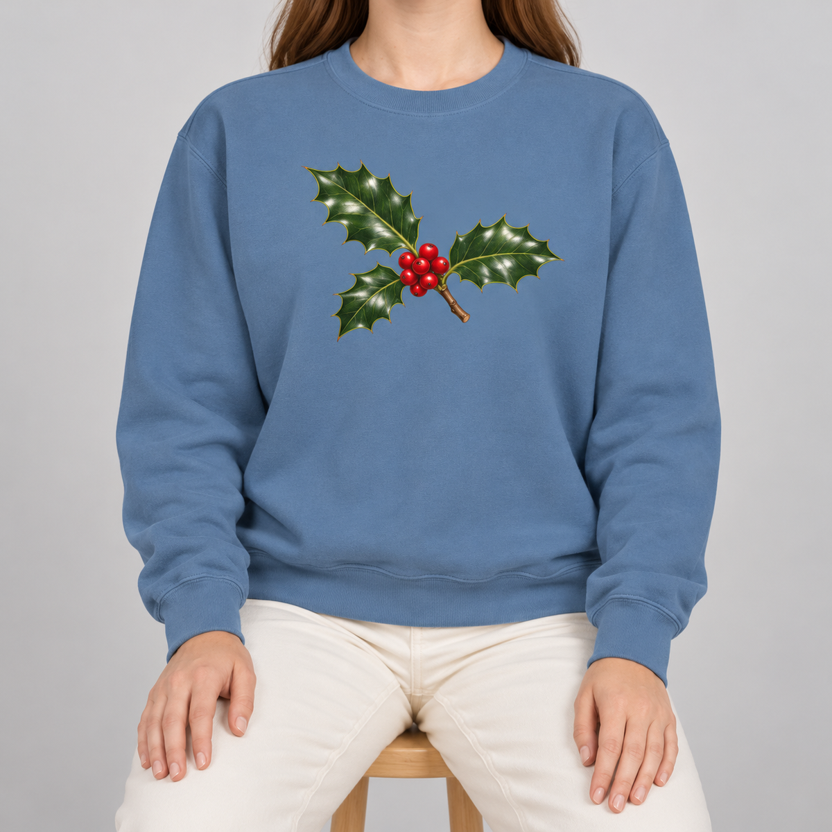 Holly sweatshirt in Blue Jean worn, holly sprig with red berries