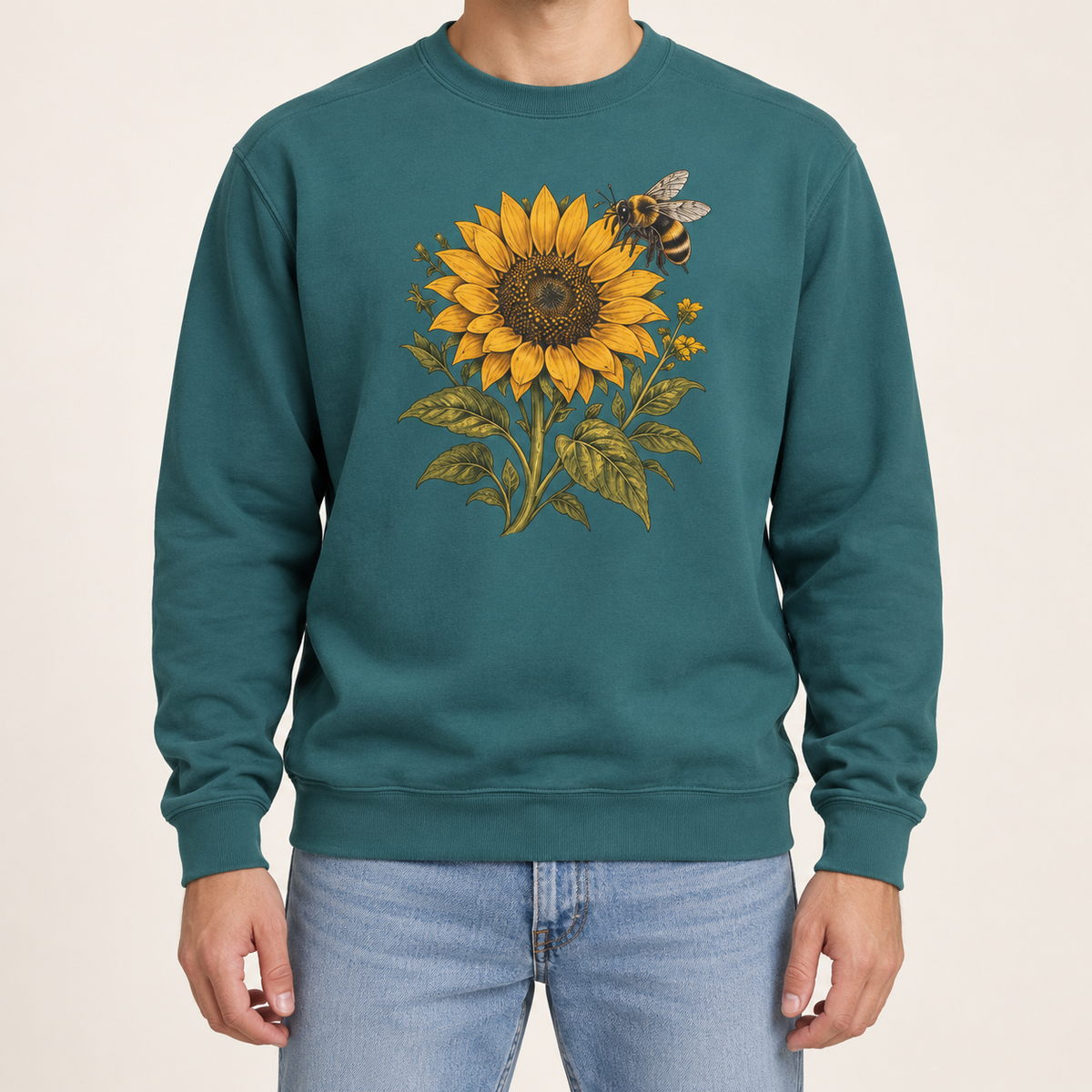 Sunflower and bumblebee sweatshirt in Blue Spruce, the botanical sunflower and bee print on a deep forest green garment-dyed Comfort Colors 1566 crewneck