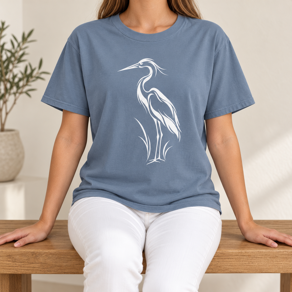 Flowing Great Blue Heron T-Shirt in Blue Jean — white line-art heron on a garment-dyed Comfort Colors tee