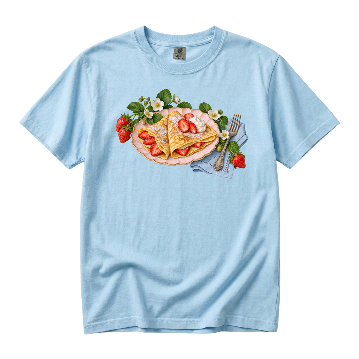 Breakfast Can Be an Occasion tee in Chambray, strawberry crepes on a scalloped pink plate with blossoms and a blue napkin