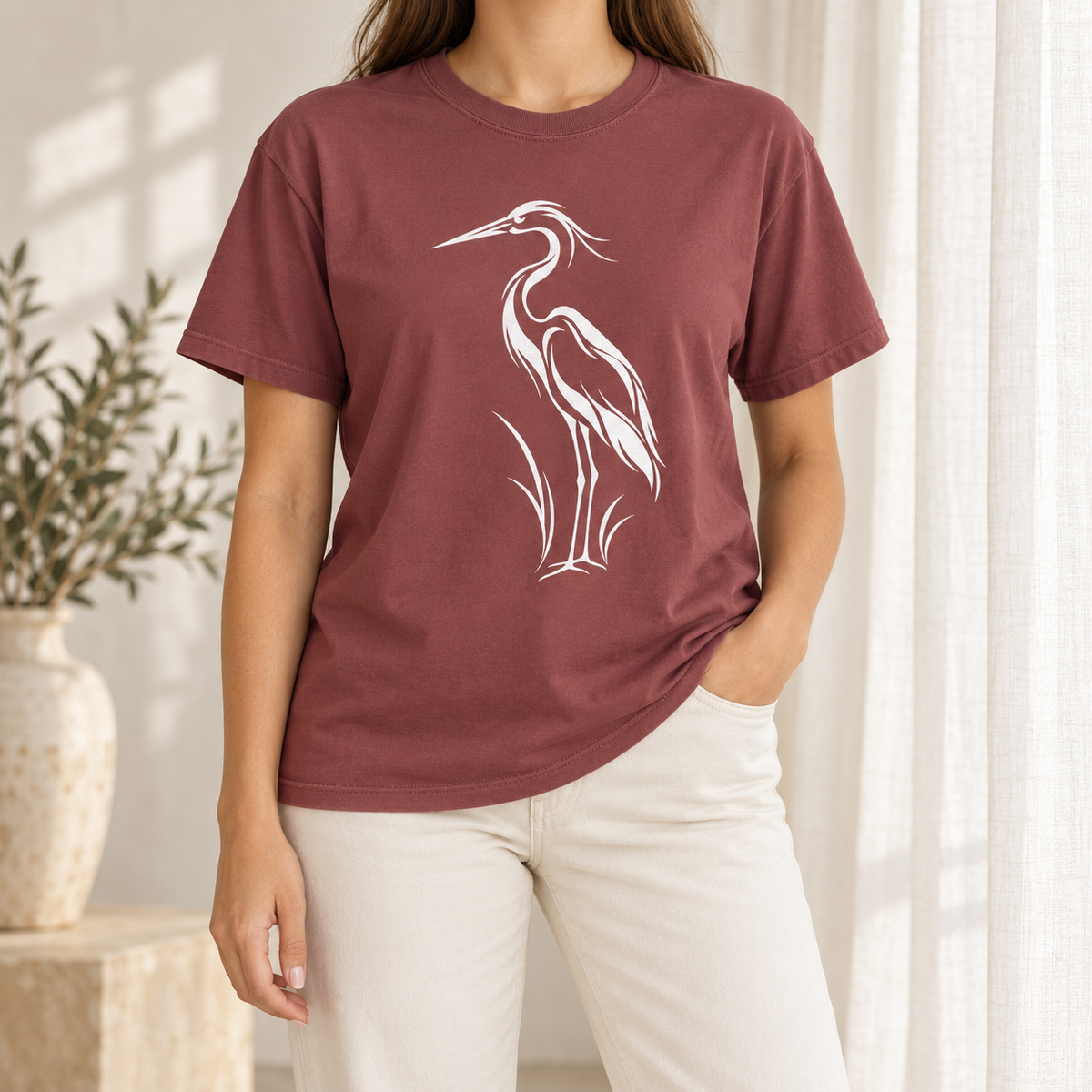 Flowing Great Blue Heron T-Shirt in Brick — white line-art heron on a garment-dyed Comfort Colors tee