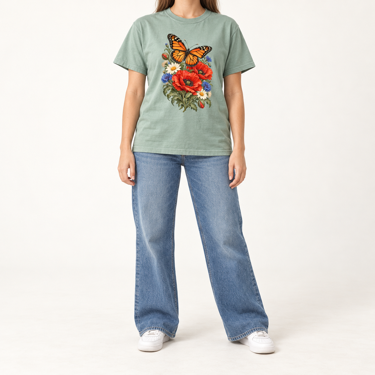 Red Poppies and Butterfly T-Shirt — an orange-and-black butterfly above red poppies, cream daisies and blue flowers, printed not embroidered