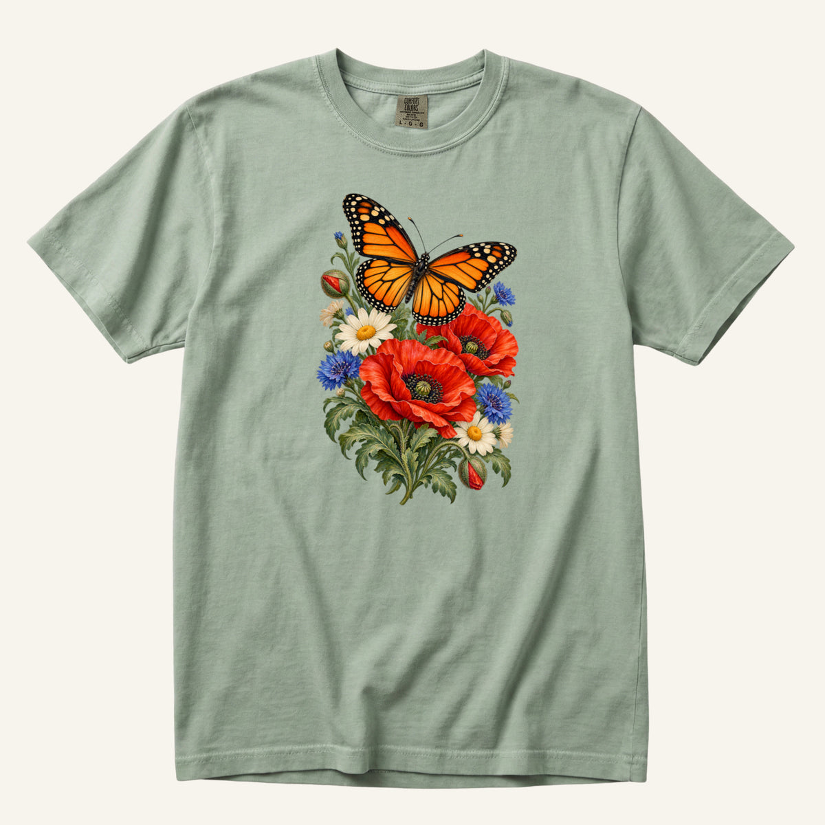 Red Poppies and Butterfly T-Shirt in Bay — soft blue-green, with red poppies, cream daisies and an orange-and-black butterfly