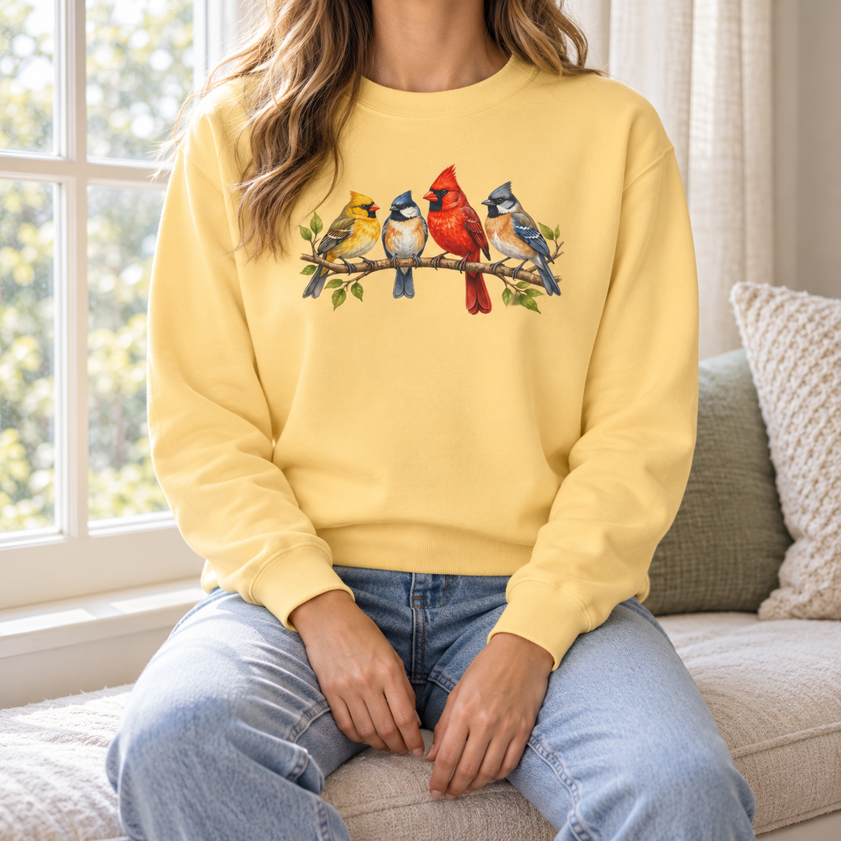 Butter sweatshirt with four songbirds on a branch - Four Colorful Songbirds on a Leafy Branch Sweatshirt lifestyle photo