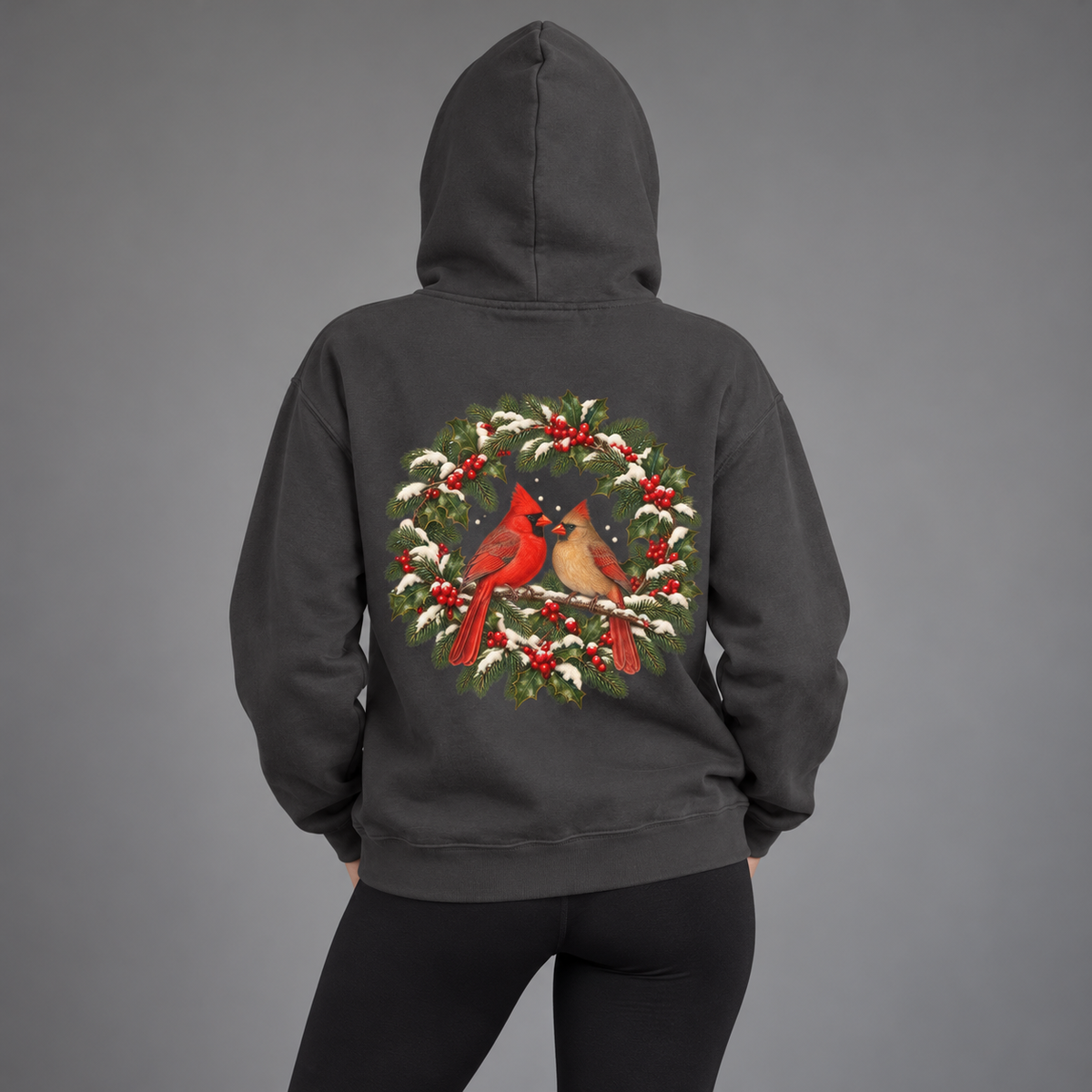 Winter Cardinal hoodie in Pepper worn, back view with the cardinal wreath print