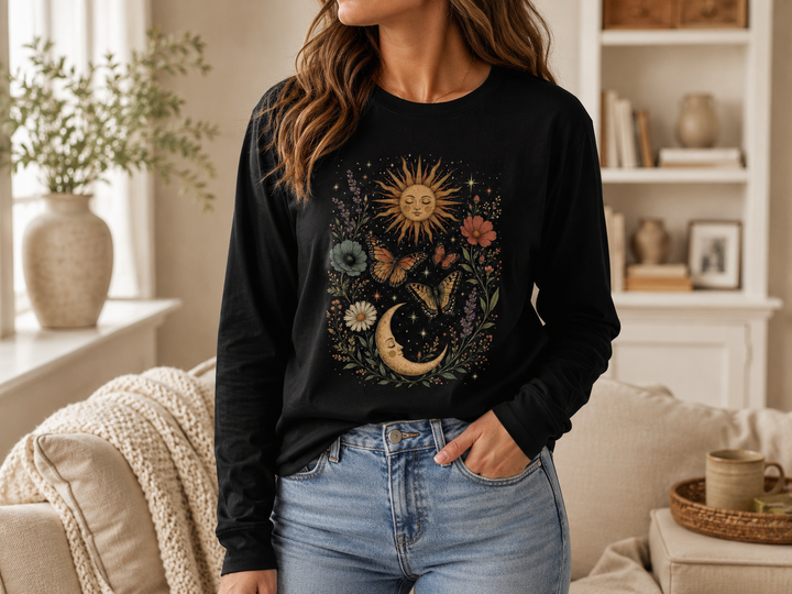 Celestial Garden sun and moon wildflower butterfly design on a heavyweight black long-sleeve tee