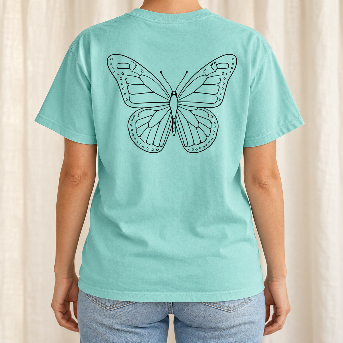 Monarch Butterfly Front and Back T-Shirt in Chalky Mint, back view - large line-art monarch on pale mint cotton