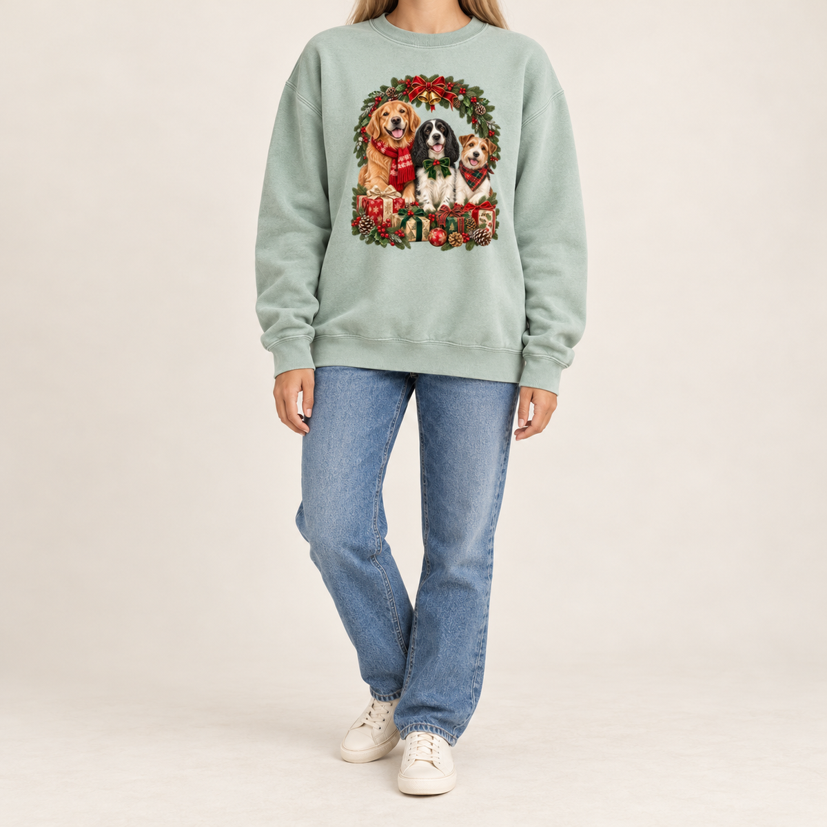 The three-dog Christmas wreath print shown on the Chalky Mint garment-dyed Comfort Colors 1566 crewneck sweatshirt