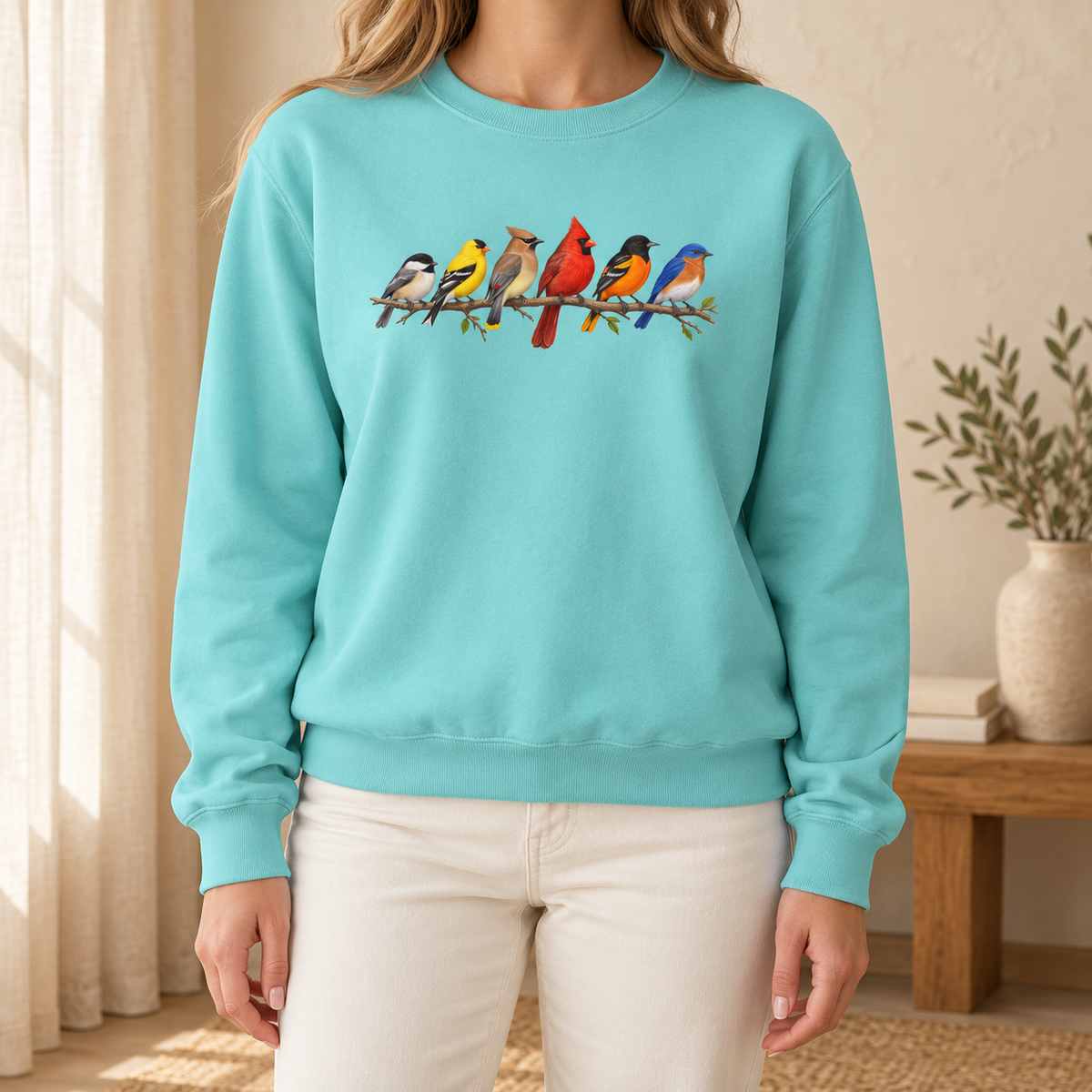 Colorful Birds on Branches sweatshirt in Chalky Mint — six painted songbirds on one branch: chickadee, goldfinch, cedar waxwing, northern cardinal, Baltimore oriole and eastern bluebird, on a garment-dyed Comfort Colors crewneck