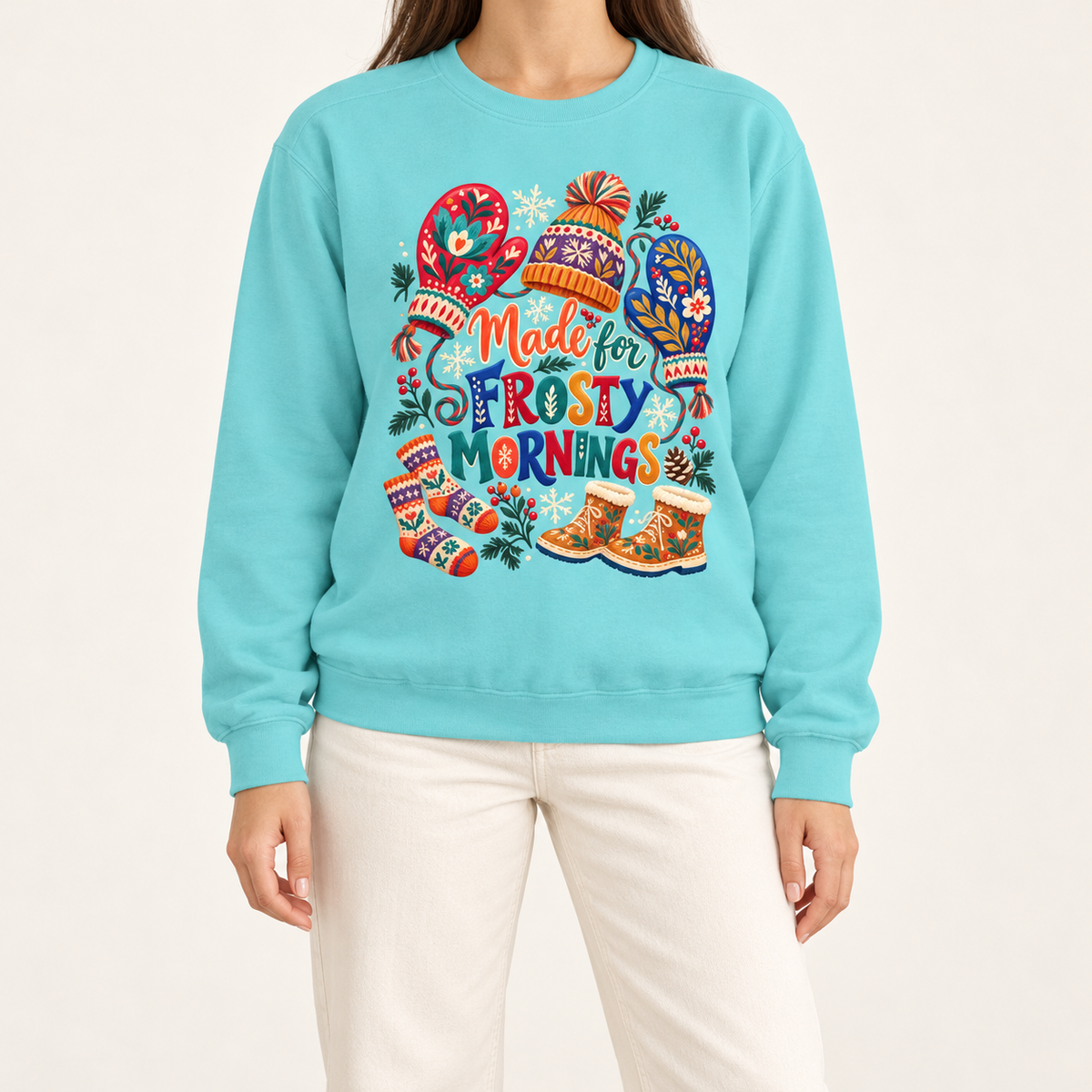 Made for Frosty Mornings sweatshirt in Chalky Mint - mittens, a pom-pom hat, a striped scarf, knitted socks and snow boots printed in full color on a light aqua garment-dyed Comfort Colors crewneck