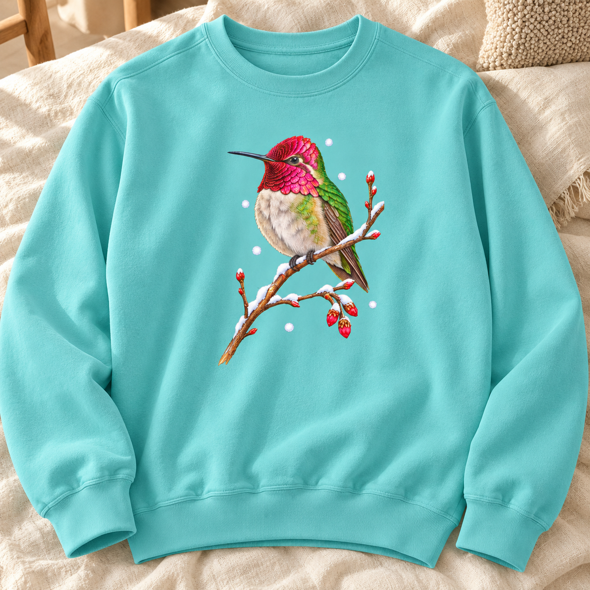 Winter Hummingbird Sweatshirt in Chalky Mint - a watercolor Anna's hummingbird with a magenta head perched on a snowy twig, printed on a garment-dyed Comfort Colors 1566 crewneck