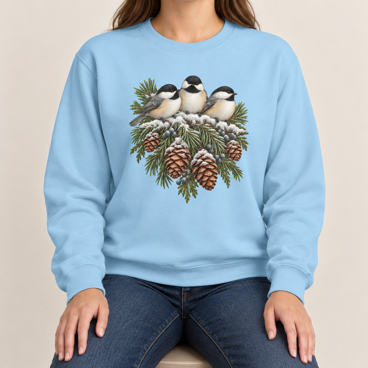 Chambray chickadee sweatshirt - three snowy chickadees and pinecones on a washed blue garment-dyed crewneck