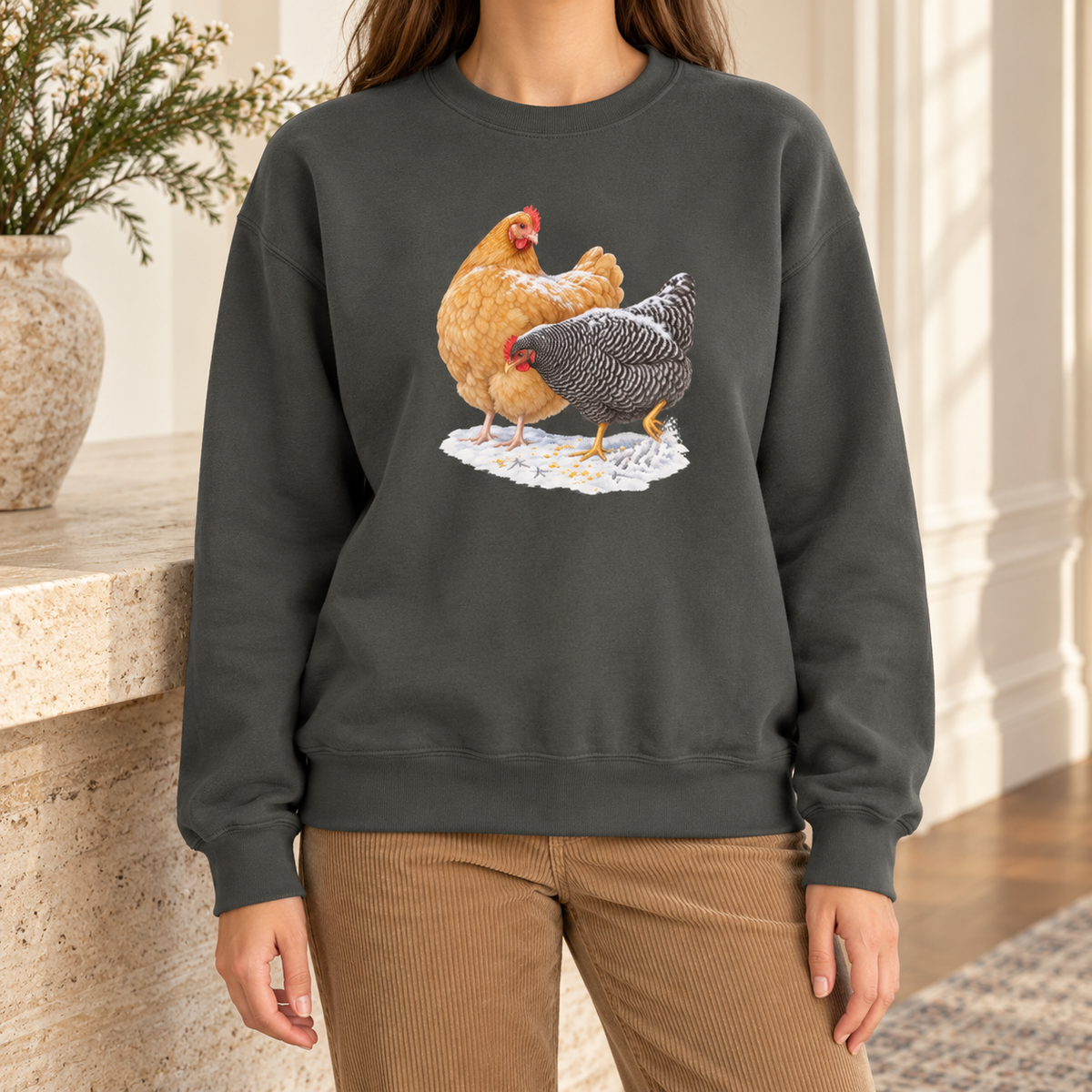 Winter hens sweatshirt in Pepper worn by a woman – two snowy hens on a washed charcoal Comfort Colors crewneck