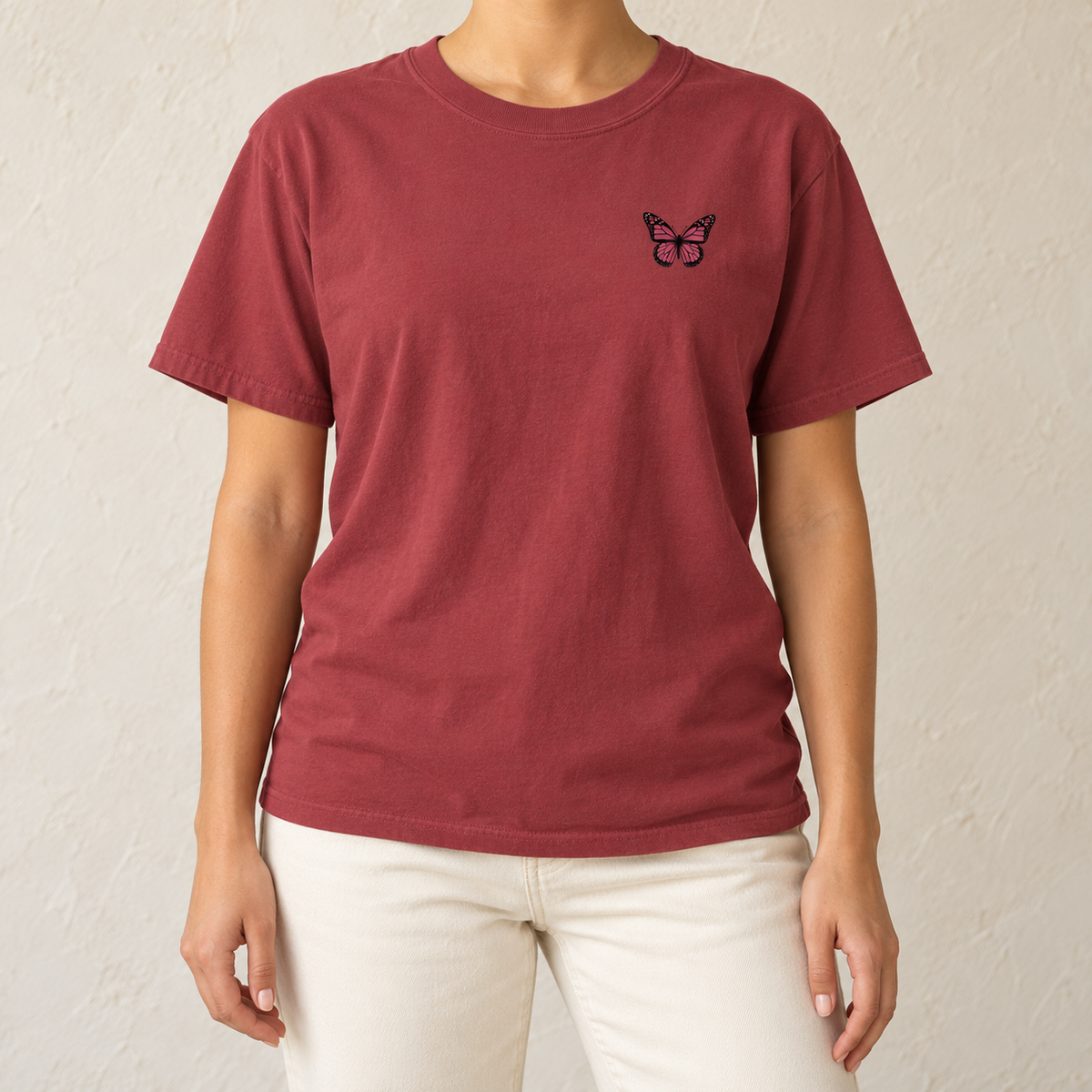 Monarch Butterfly Front and Back T-Shirt in Chili, front view - small monarch at the chest of a garment-dyed tee