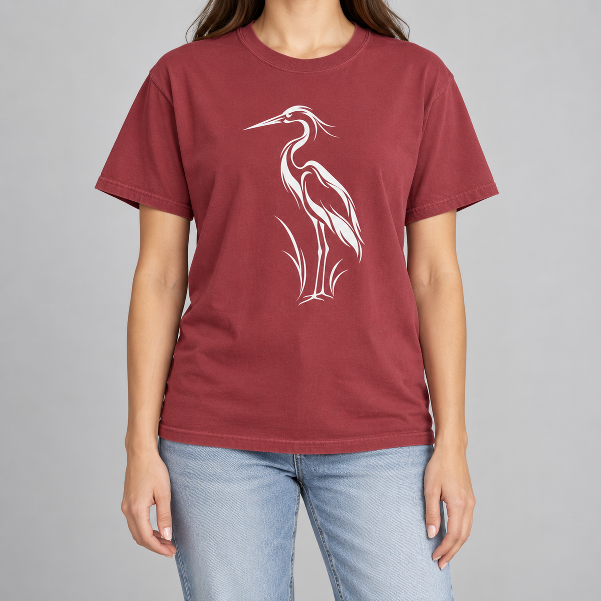 Flowing Great Blue Heron T-Shirt in Chili — white line-art heron on a garment-dyed Comfort Colors tee