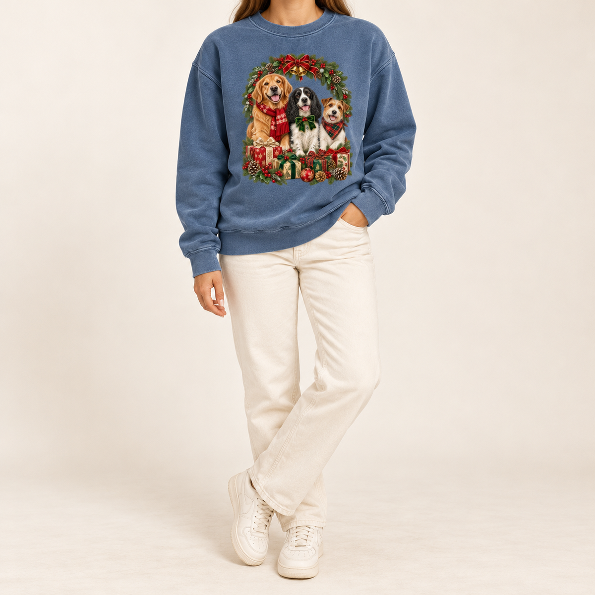 The three-dog Christmas wreath print shown on the Denim garment-dyed Comfort Colors 1566 crewneck sweatshirt