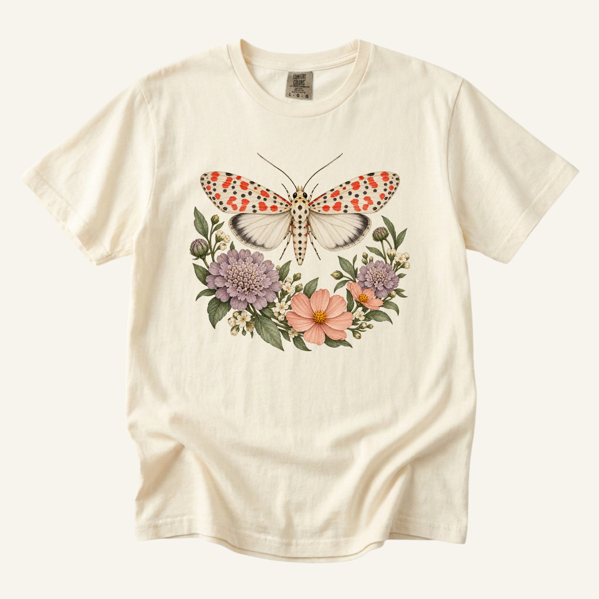 Moth T-Shirt in Ivory — crimson speckled moth with wildflowers, made to order in the USA