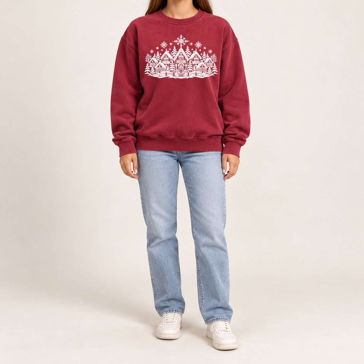The winter village line art on the Crimson garment-dyed Comfort Colors 1566 crewneck sweatshirt