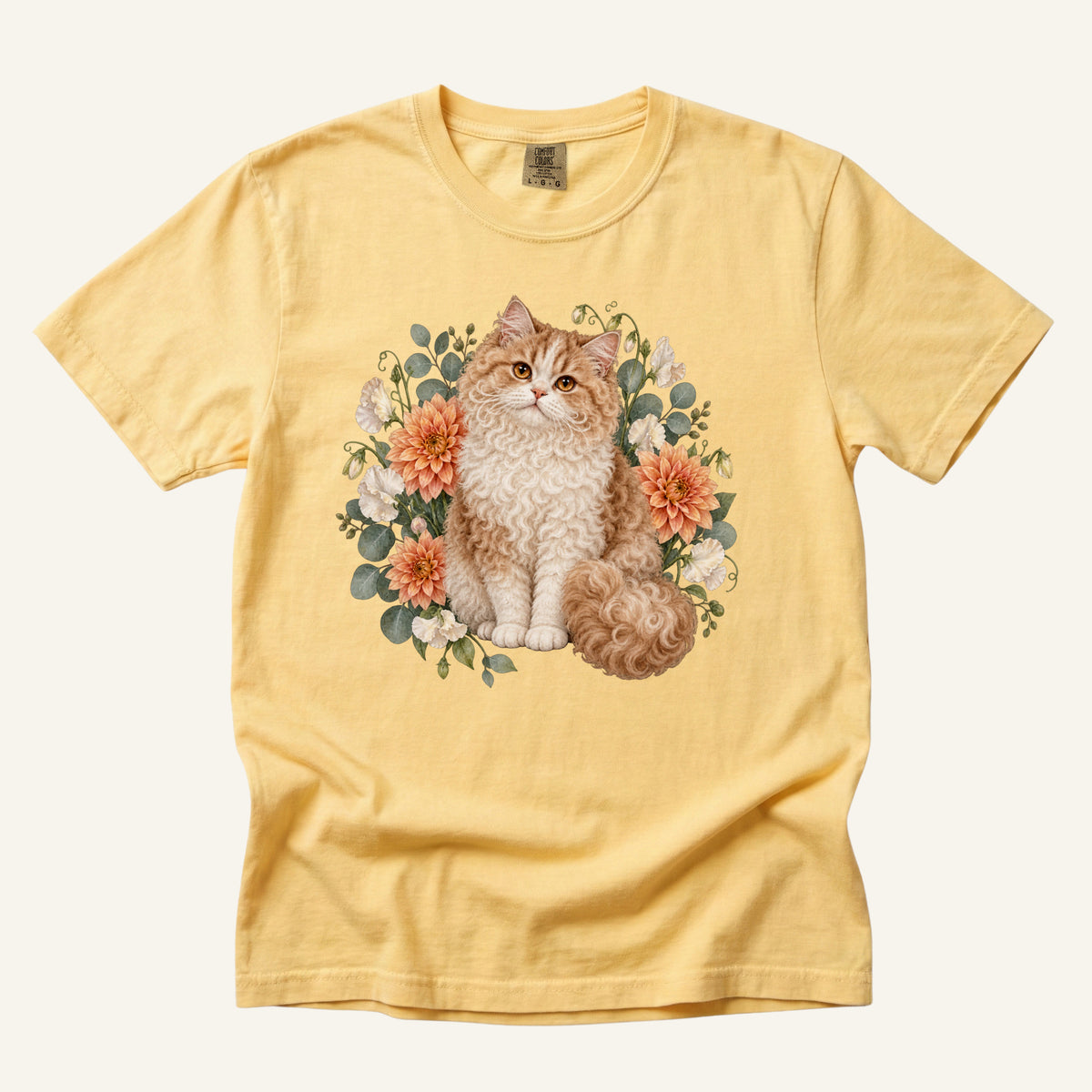 Selkirk Rex Cat T-Shirt in Butter — curly-fur cat with dahlias, botanical watercolor front print